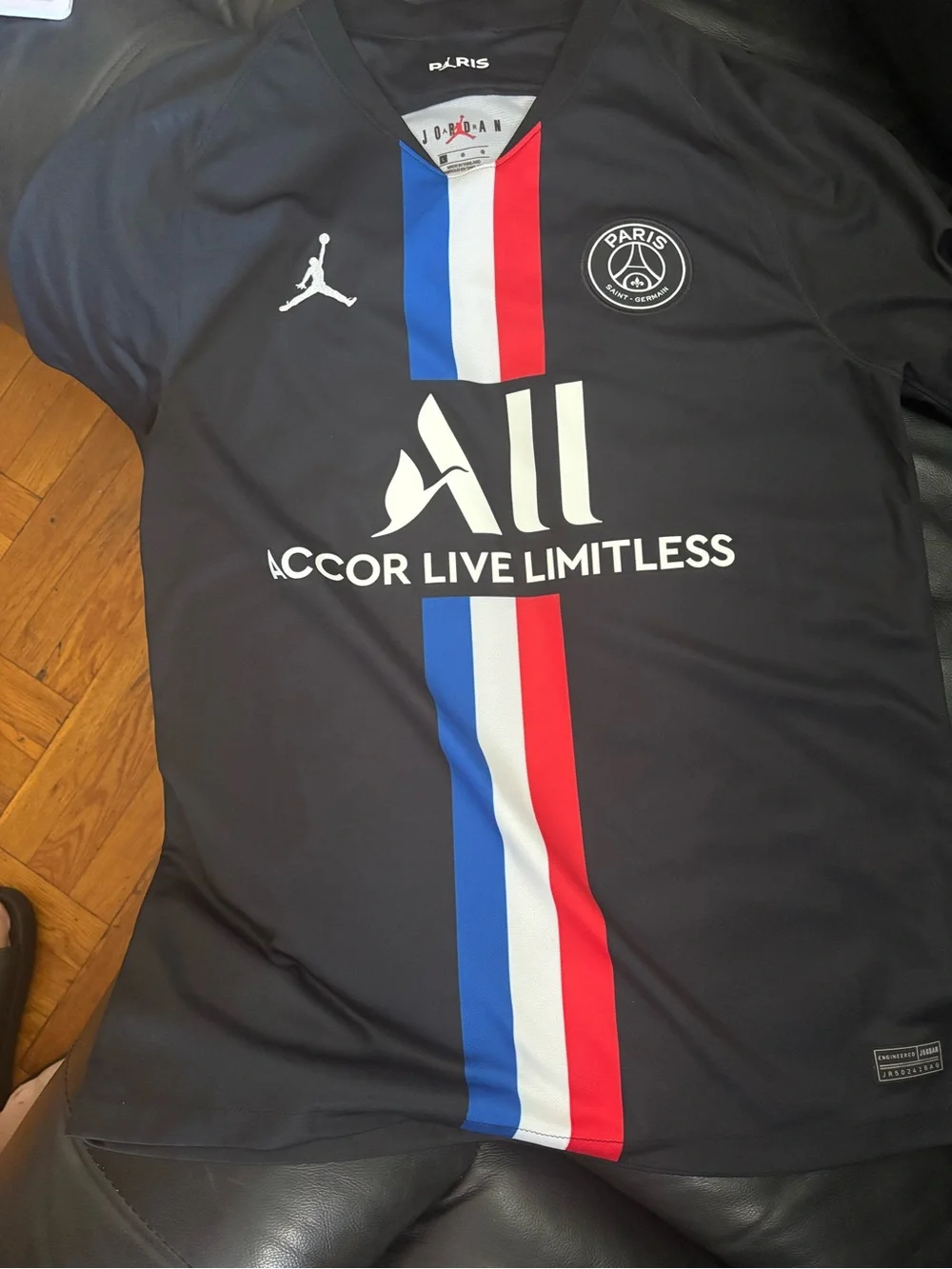 Jordan Men’s Black PSG Football Jersey with Red, White & Blue Stripes